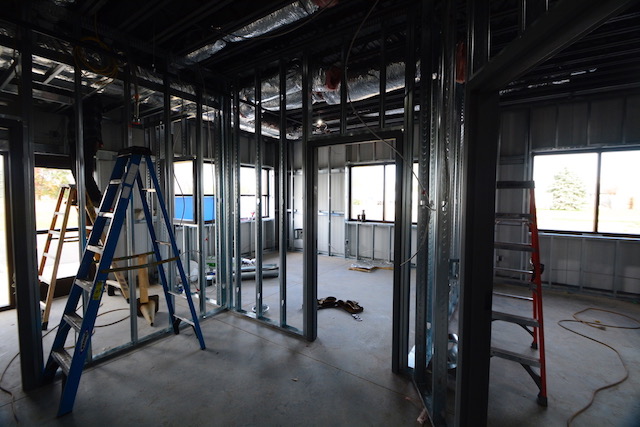 Framed in corner Office at the Venture Drive Plant