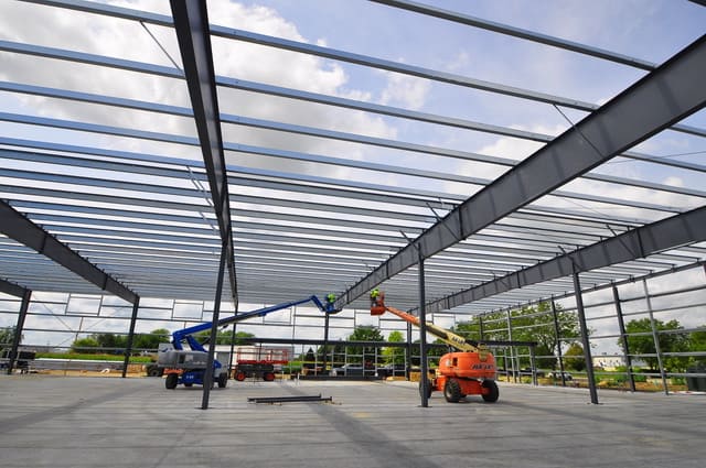 Western container janesville plant being built with lifts far view